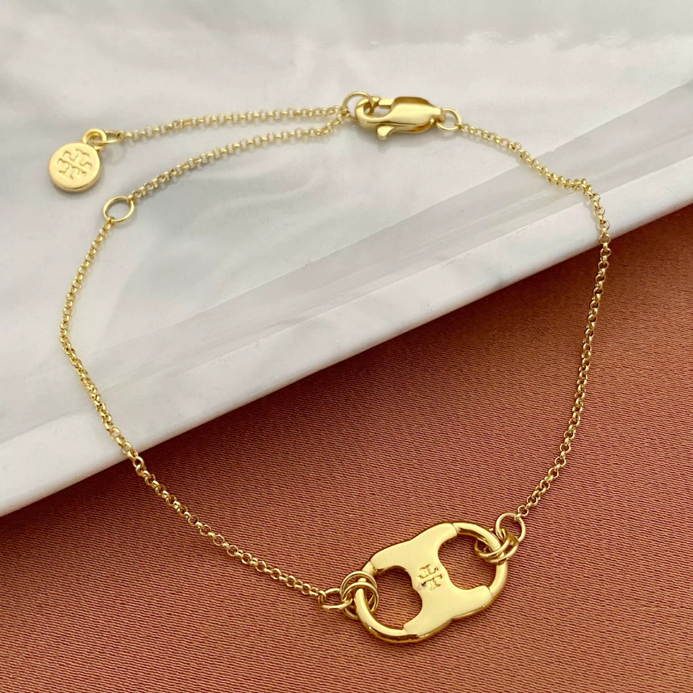 Tory Burch Inlaid Pig Nose Pendant Bracelet